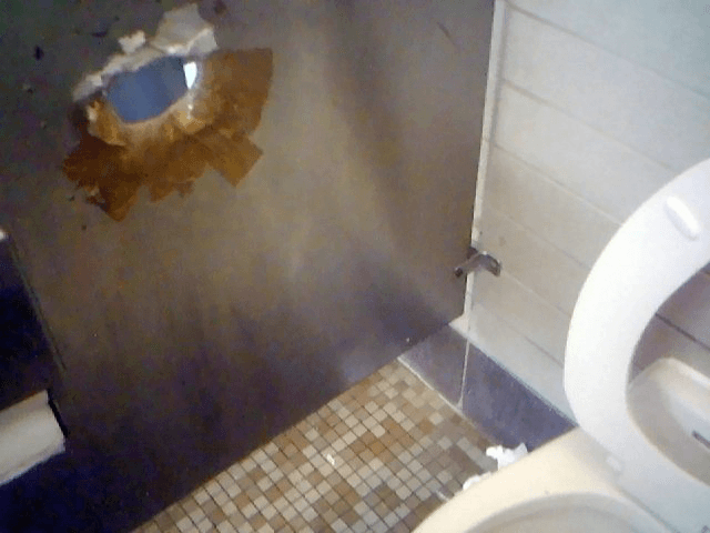An authentic washroom glory hole